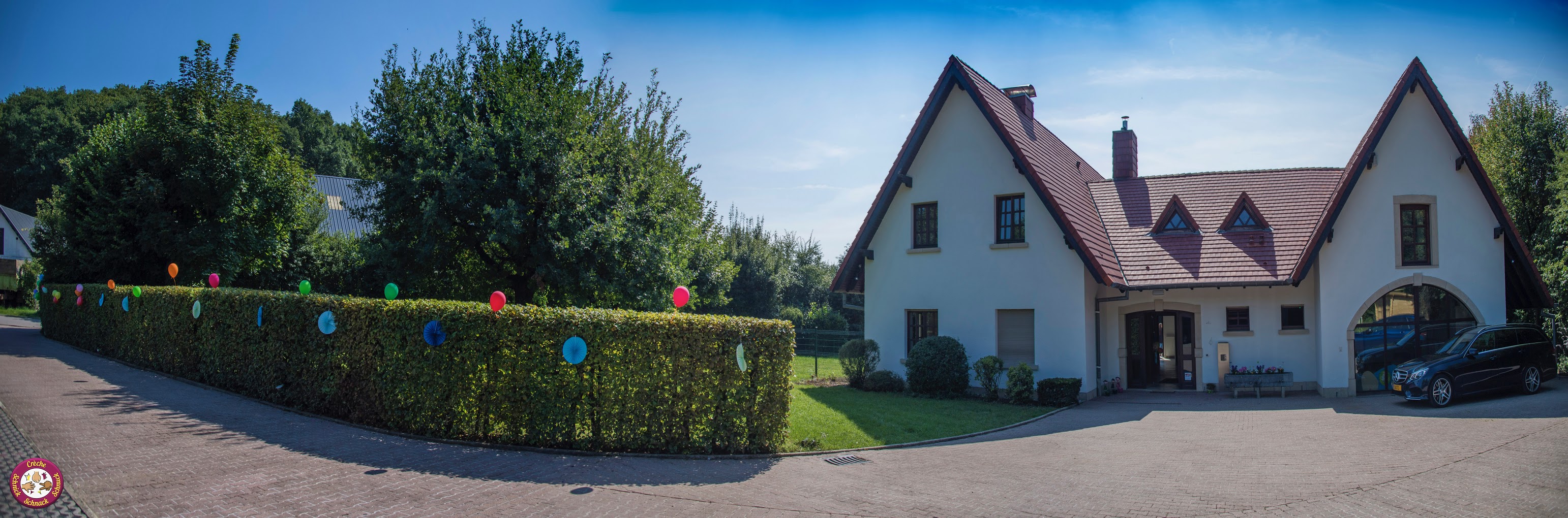 Crèche Schnick Schnack Schnuck à Kockelscheuer, bâtiment extérieur sous le soleil